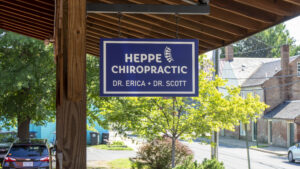 alt="Photo of blue and white blade sign for Chiropractor located in downtown, Fredericksburg, Virginia"