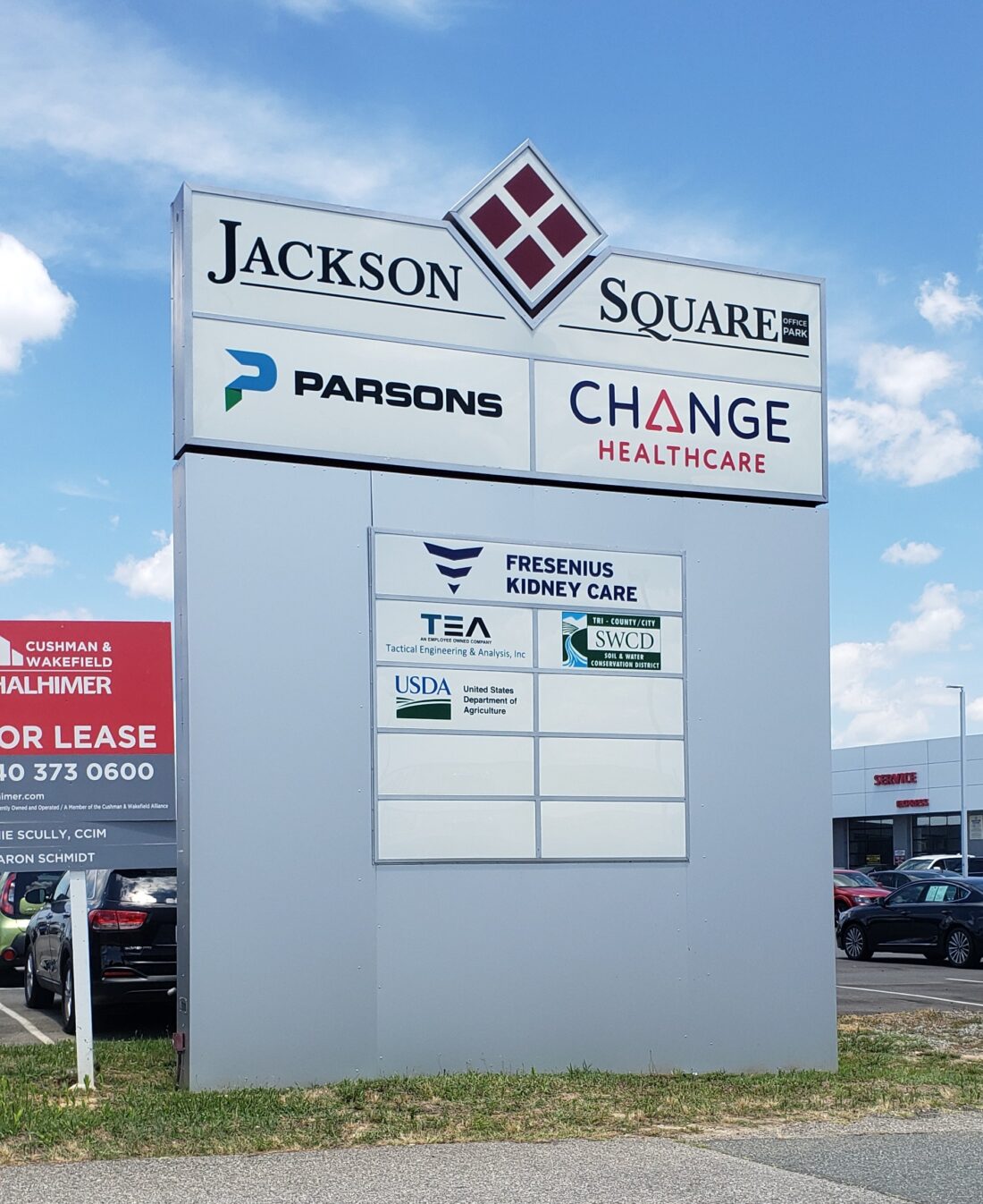 alt="Photo of large monument sign with various tenant panels in Spotsylvania, Virginia"