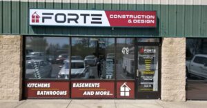 alt="Photo of Red & White various signs and graphics for construction company facade located in Spotsylvania, Virginia"