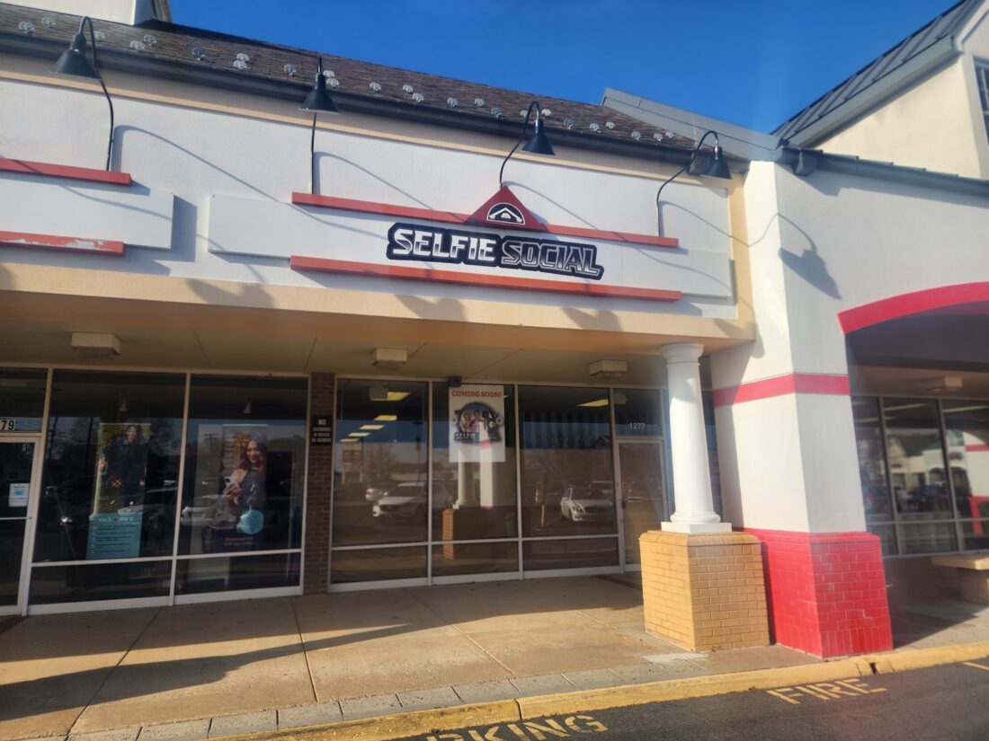 alt="Photo of aluminum formed pan sign for strip center selfie shop located in Fredericksburg, Virginia"