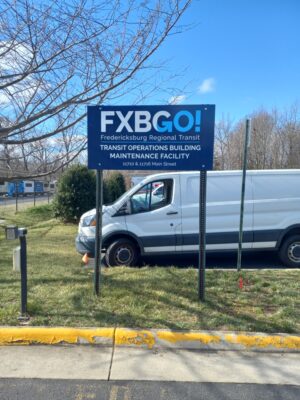 alt="Photo of FXBGO blue wayfinding sign located in Spotsylvania, Virginia"