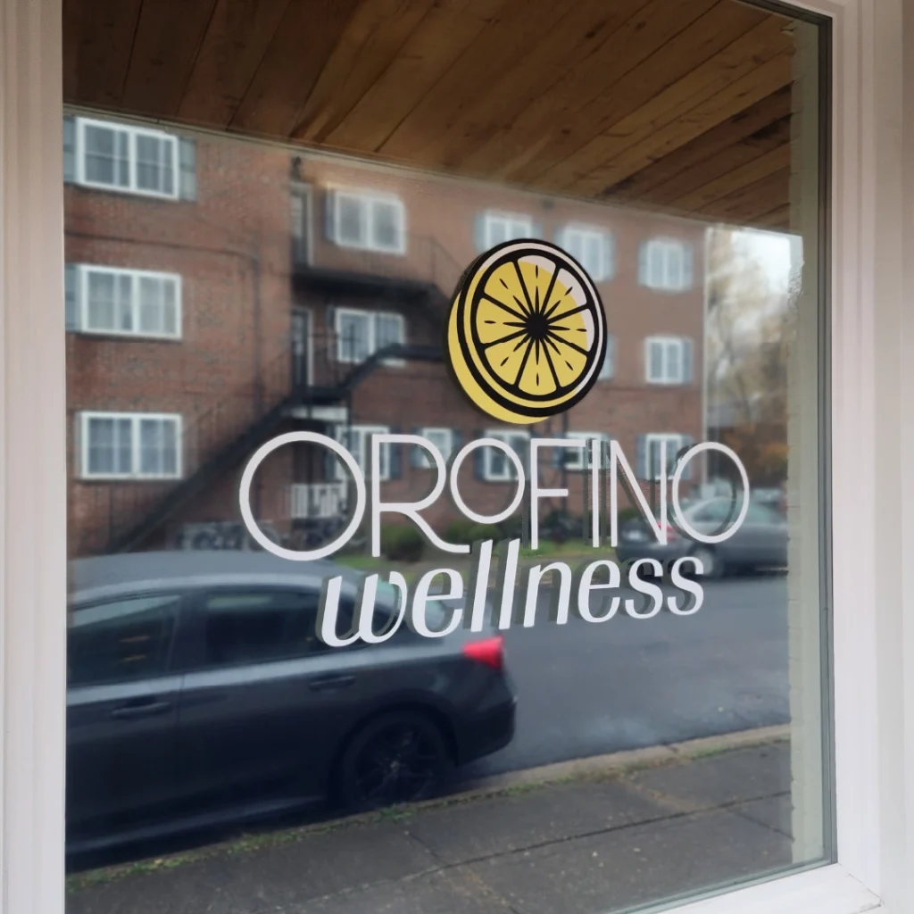 A vinyl matte laminated graphic for Orofino Wellness featuring a lemon image, created by Distinct Sign Solutions in Fredericksburg, VA.