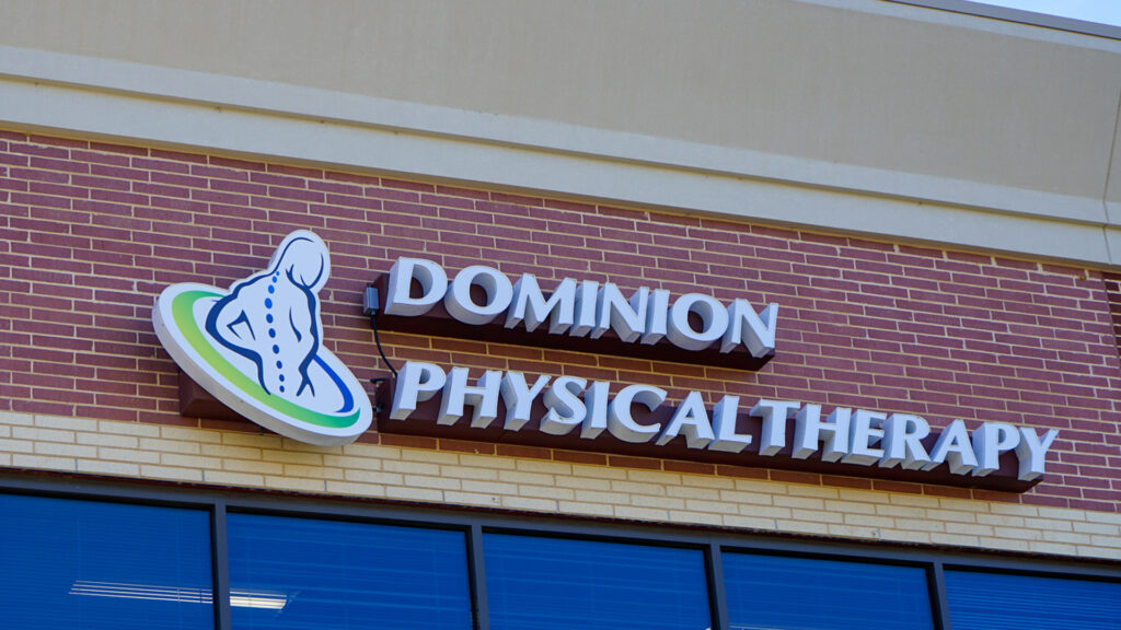 An illuminated building sign for Dominion Physical Therapy in Stafford, VA, created by Distinct Sign Solutions.