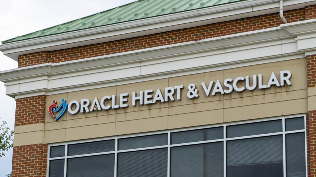 A building sign for Oracle Heart & Vascular in Fredericksburg, VA, created by Distinct Sign Solutions.