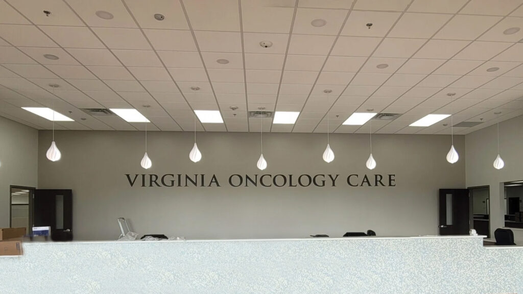 Interior office signage for the Virginia Oncology Care Center in Fredericksburg, VA, created by Distinct Sign Solutions.