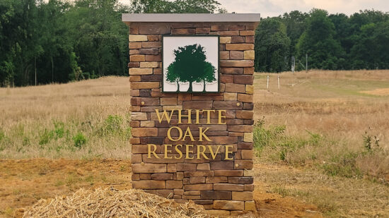 Exterior signage for White Oak Reserve, created by Distinct Sign Solutions (DSS).