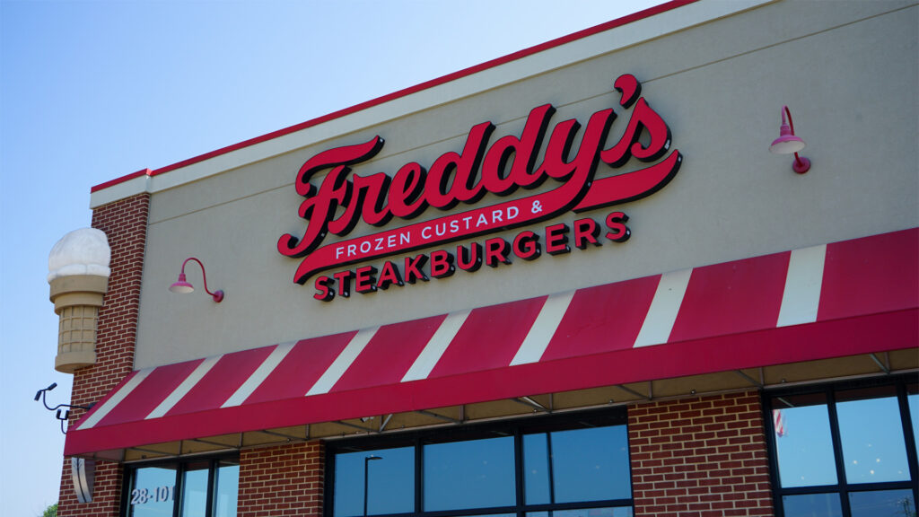 A view of the channel letter sign and awning for Freddy's Steakburgers. The channel letter sign was installed by Distinct Sign Solutions in Fredericksburg, Virginia.