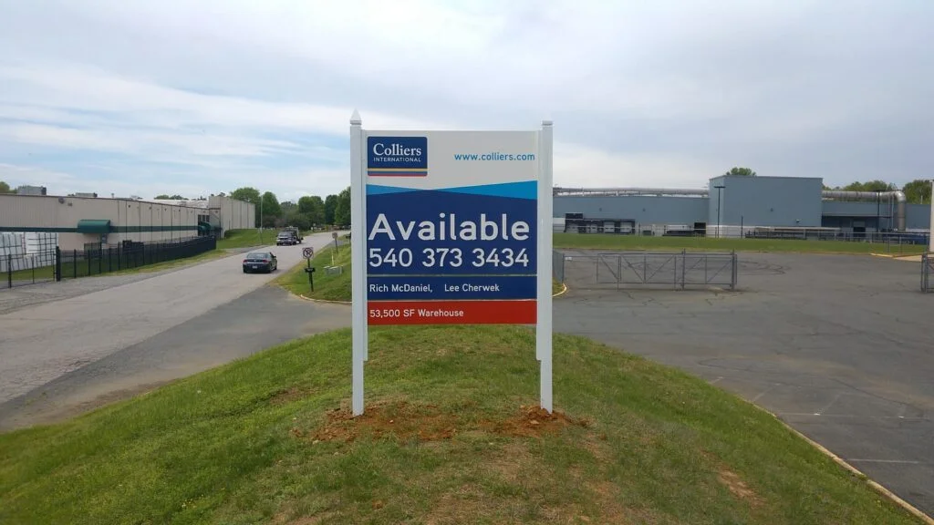 Post and panel sign by Distinct Sign Solutions for Colliers International displaying availability of a 53,500 SF warehouse in Fredericksburg, VA, with clear contact information.