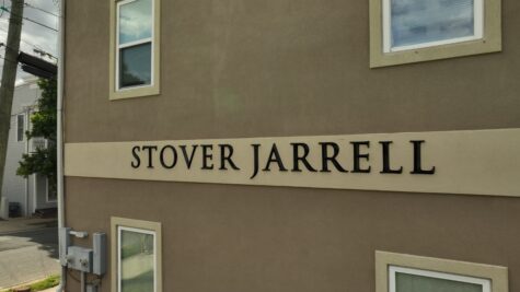 Wall with STOVER JARRELL sign displayed in black prismatic style in Fredericksburg, Virginia