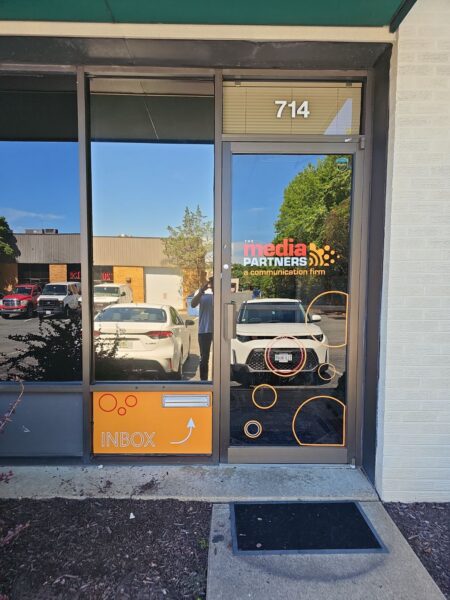 The Media Partners – Custom Window & Door Graphics