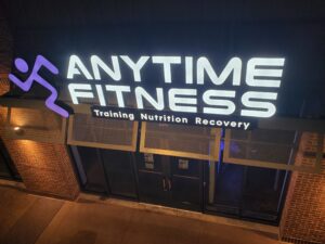 A nighttime view of the illuminated channel letter sign for Anytime Fitness in Stafford, VA, created by Distinct Sign Solutions in Fredericksburg, VA.