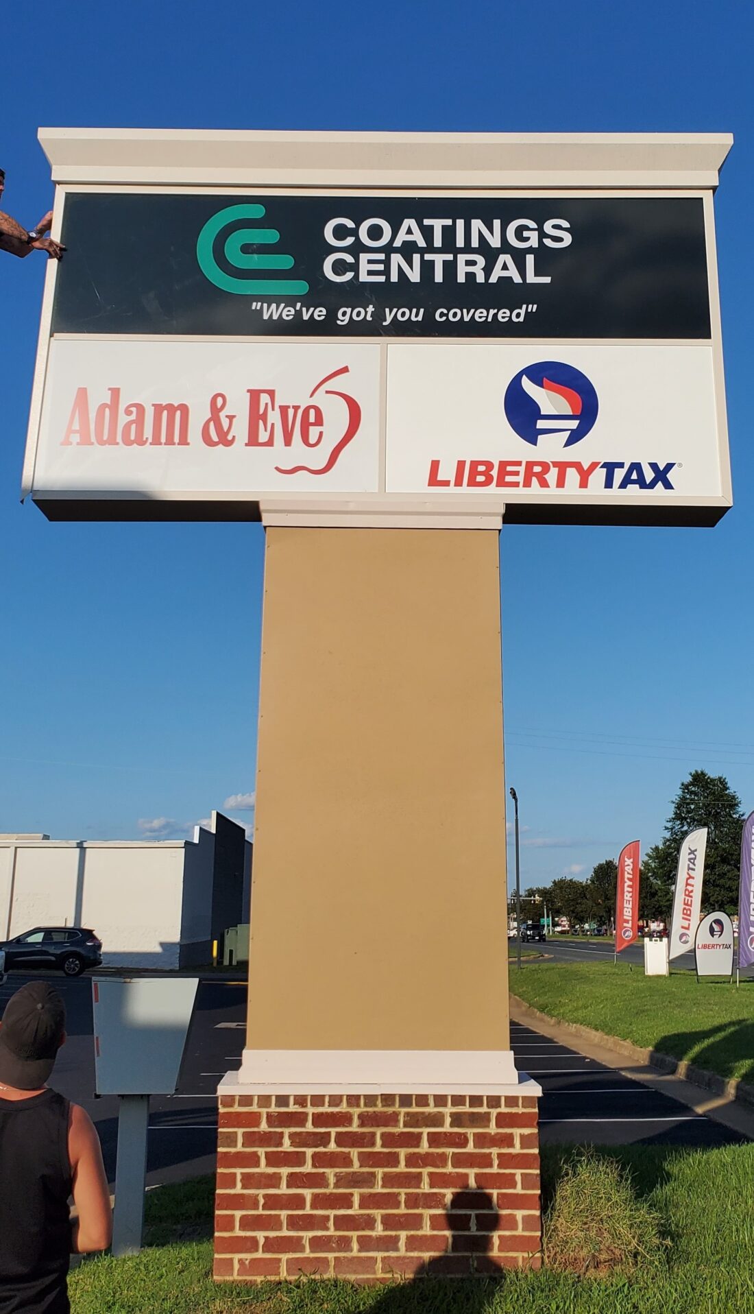 Newly installed green Coatings Central Pylon acrylic sign in existing pylon sign. Sign is located in Spotsylvania, VA, manufactured & installed by Distinct Sign Solutions in Fredericksburg, VA