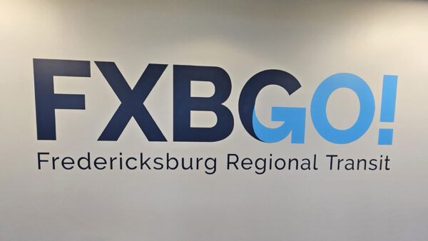 A downtown sign created by Distinct Signs for FXBGO! Indoor vinyl graphic.