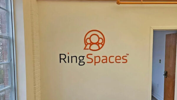 A downtown sign created by Distinct Signs for RingSpaces. An indoor acrylic wall sign.