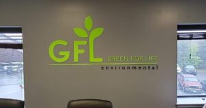 Photo of lime green acrylic wall sign mounted to drywall in Spotsylvania, VA. Sign was manufactured & installed by Distinct Sign Solutions in Fredericksburg, VA.