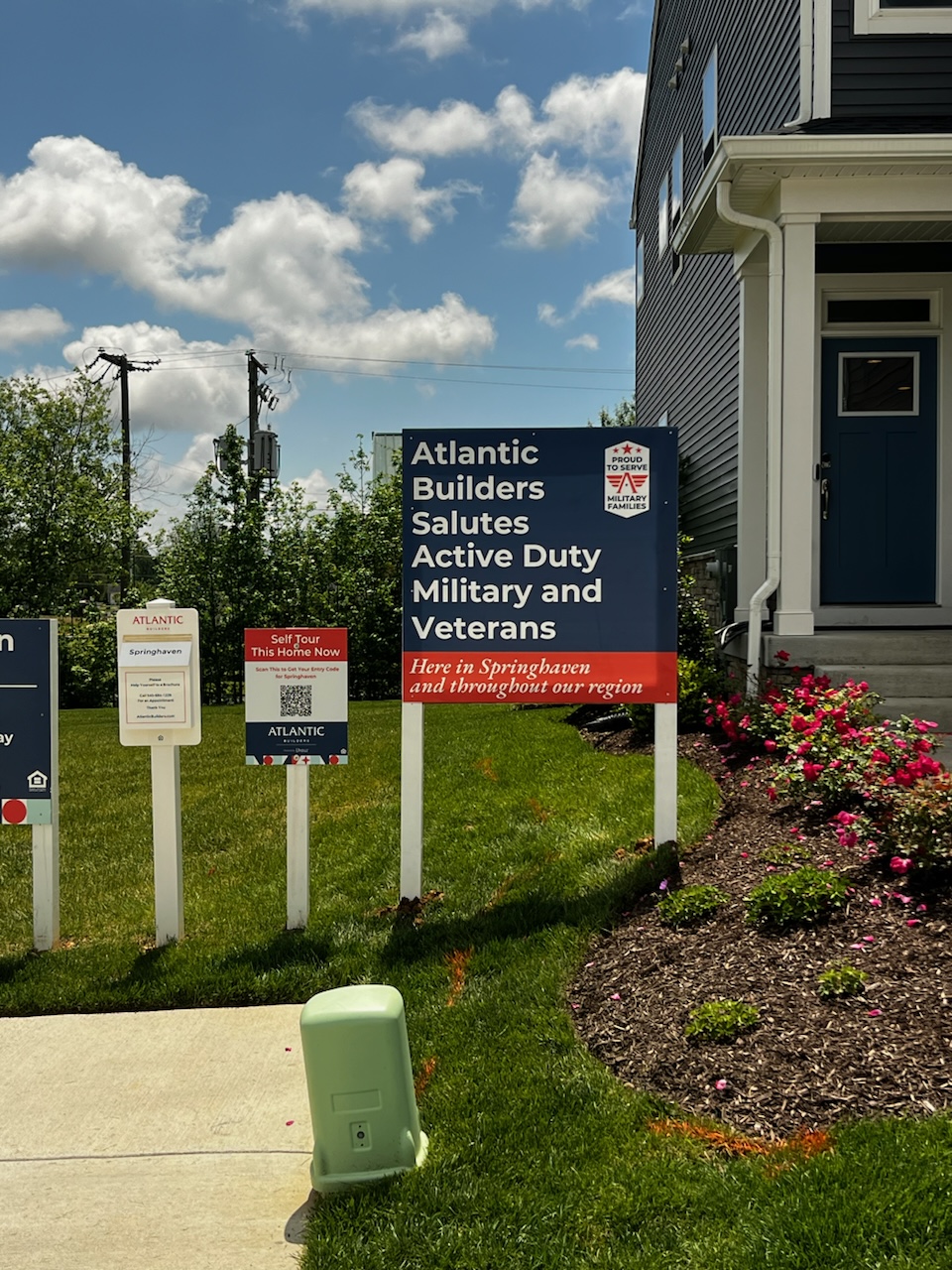 Photo of several commercial home builder sings at entrance of community in Spotsylvania, VA. Signs were manufactured & installed by Distinct Sign Solutions in Fredericksburg, VA