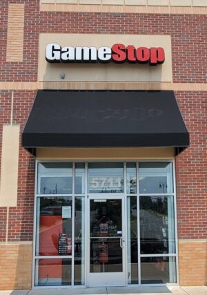 Photo of black awning for GameStop, located in Spotsylvania, VA. Awning was manufactured & installed by Distinct Sign Solutions in Fredericksburg, VA