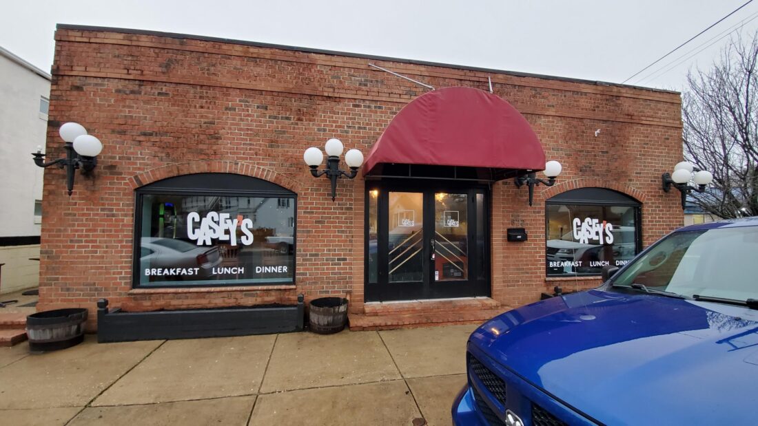 Photo of graphics installed on restaurant storefront windows & doors in Fredericksburg, VA, installed by Distinct Sign Solutions in Fredericksburg, VA