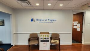 Photo of blue & gray vinyl graphic on drywall in medical office in Richmond, VA. Graphic installed by Distinct Sign Solutions in Fredericksburg, VA