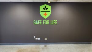 Photo of lime green acrylic sign mounted to drywall in Ruckersville, VA. Sign was manufactured & installed by Distinct Sign Solutions in Fredericksburg, VA