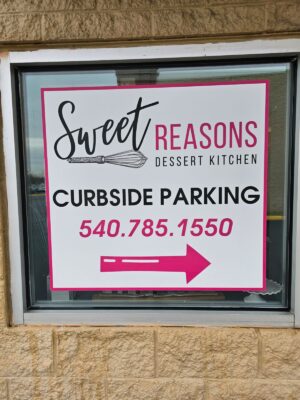 Photo of Sweet Reasons curbside graphic applied to glass pane in Fredericksburg, VA. Sign was manufactured & installed by Distinct Sign Solutions in Fredericksburg, VA