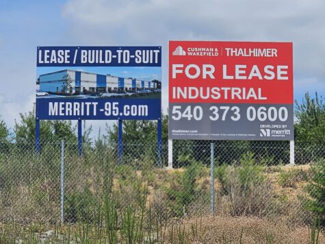 Photo of 2 large post & panels signs located on a hill along the interstate in Stafford VA. Sign was manufactured & installed by Distinct Sign Solutions in Fredericksburg, VA