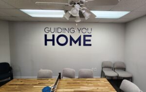 Photo of acrylic wall sign for lobby in Richmond, VA. Sign was manufactured & installed by Distinct Sign Solutions in Fredericksburg, VA