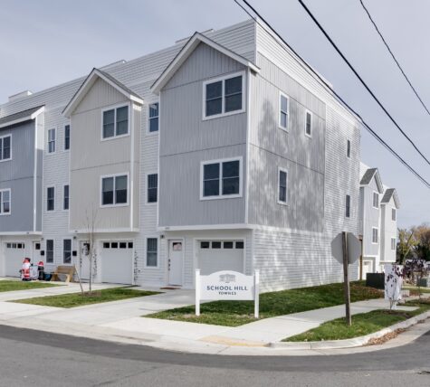 Photo of monument sign in front of townhome subdivision in Colonial Beach, VA. Sign was manufactured & installed by Distinct Sign Solutions in Fredericksburg, VA