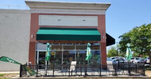 Photo of green awning located on Subway in Fredericksburg, VA. Awning was recovered by Distinct Sign Solutions in Fredericksburg, VA