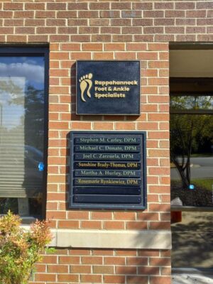 Photo of HDU black and gold sign for Rappahannock Foot & Ankle, located in Spotsylvania, VA. Sign was manufactured & installed by Distinct Sign Solutions in Fredericksburg, VA