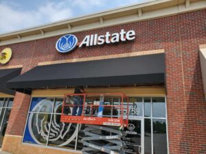 Photo of new black awning installed for Allstate in Spotsylvania, VA. Awning was manufactured & installed by Distinct Sign Solutions in Fredericksburg, VA