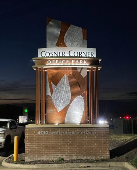 Nighttime photo of Cosner Corner sign that was recently retrofit to illuminate properly. Sign is located in Spotsylvania, VA and was repaired by Distinct Sign Solutions in Fredericksburg, VA