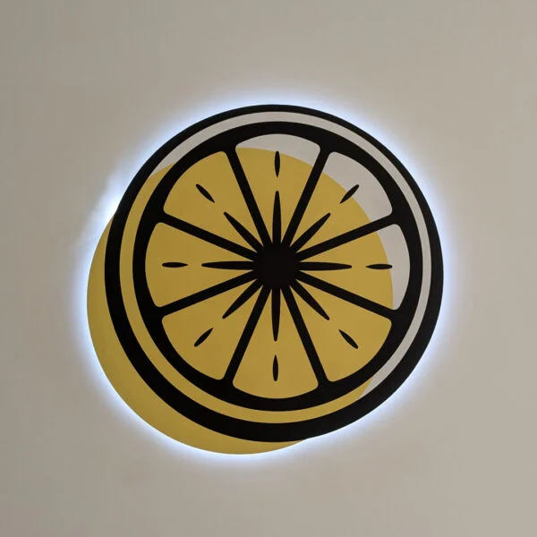 Illuminated halo sign for Orofino Wellness in Downtown Fredericksburg, created by Distinct Sign Solutions in Fredericksburg, VA, featuring a bright yellow lemon slice. 