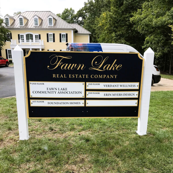 Elegant business directory sign at Fawn Lake, blending high-end aesthetics with easy-to-update tenant panels.