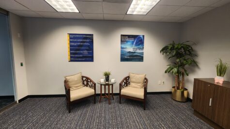 Photo of interior commercial building wall with custom printed acrylic art in Alexandria, VA. Signs were manufactured & installed by Distinct Sign Solutions in Fredericksburg, VA