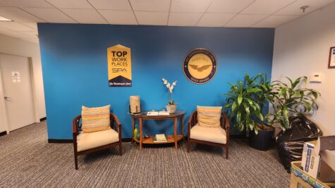 Photo of interior commercial building wall with custom printed acrylic art in Alexandria, VA. Signs were manufactured & installed by Distinct Sign Solutions in Fredericksburg, VA