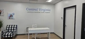 Photo of interior wall in Doctor's office that has custom vinyl graphic. Graphic was manufactured & installed by Distinct Sign Solutions in Fredericksburg, VA