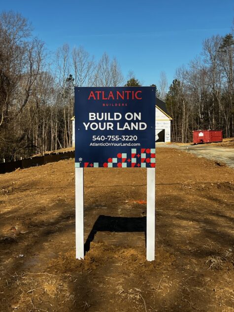 Photo of Atlantic Builders Build on Your Lot post and panel sign in King George, VA. Sign was manufactured & installed by Distinct Sign Solutions in Fredericksburg, VA