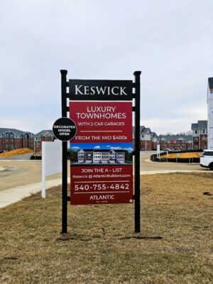 Photo of black & red home builder sign for Atlantic Builders in Spotsylvania, VA. Sign was manufactured & installed by Distinct Sign Solutions in Fredericksburg, VA