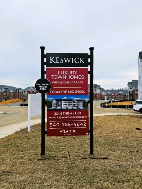 Photo of black & red home builder sign for Atlantic Builders in Spotsylvania, VA. Sign was manufactured & installed by Distinct Sign Solutions in Fredericksburg, VA