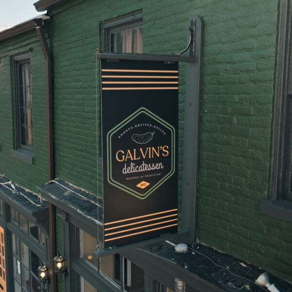Blade sign for Galvin’s Delicatessen by Distinct Sign Solutions in Fredericksburg, VA, featuring classic restaurant sign design.