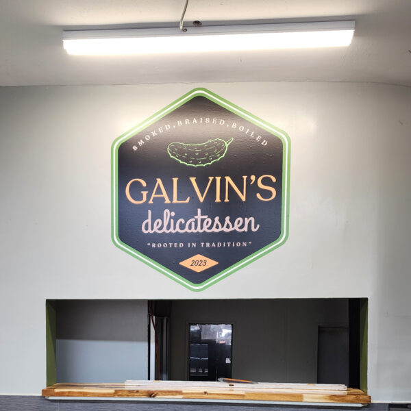 Interior wall sign for Galvin’s Delicatessen installed by Distinct Sign Solutions in Fredericksburg, VA