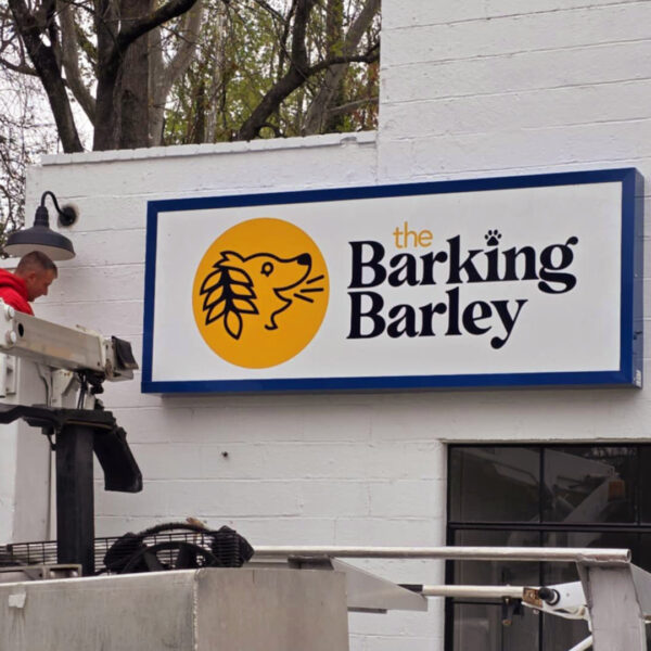 Building sign installation for The Barking Barley by Distinct Sign Solutions in Fredericksburg, VA