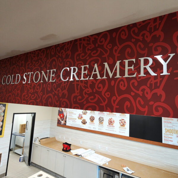 Brushed metal wall letters installed at Cold Stone Creamery by Distinct Sign Solutions