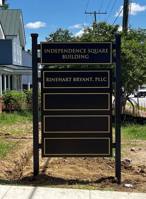 Photo of black & gold post and panel monument directory sign for Independence Square in Spotsylvania, VA. Sign was manufactured & installed by Distinct Sign Solutions in Fredericksburg, VA