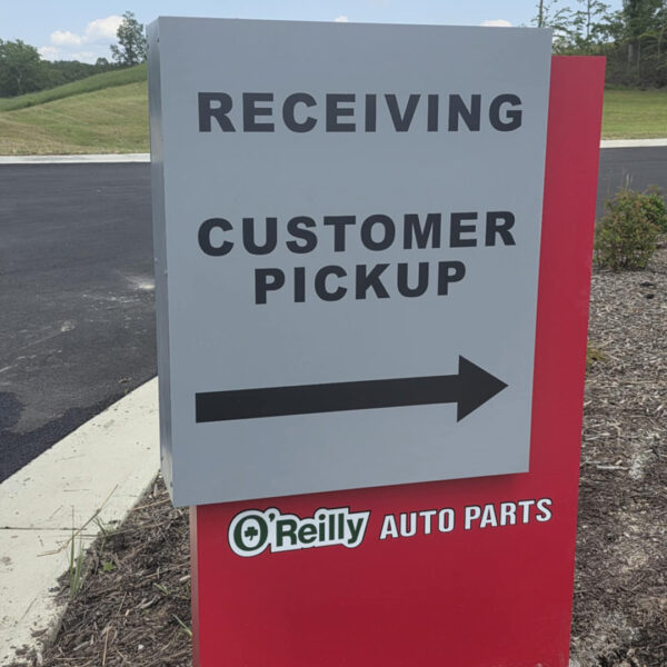 Directional sign for customer pickup and receiving area at O’Reilly Auto Parts