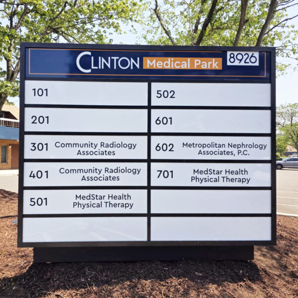 Large freestanding directory sign showing suite numbers and healthcare tenants at Clinton Medical Park