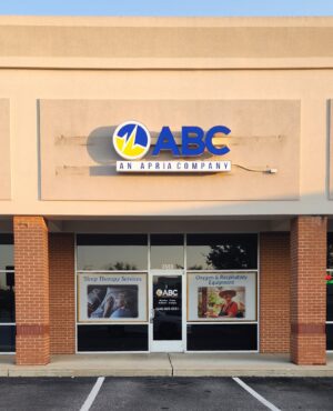 Photo of blue, yellow, and white channel letter sign mounted to EIFS wall in Fredericksburg, VA. Sign was manufactured by Distinct Sign Solutions in Fredericksburg, VA