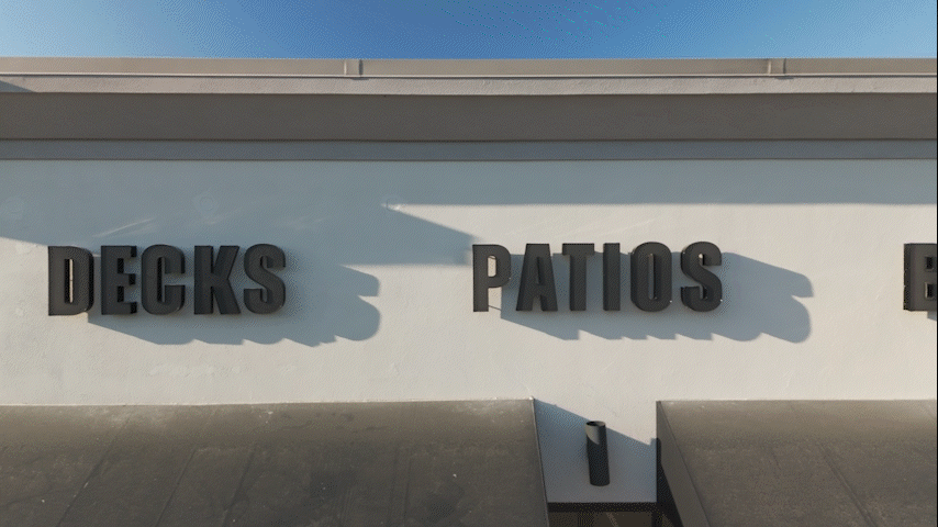Animated side scrolling zoom out GIF of the Fletcher Home Improvement Showroom signage project.