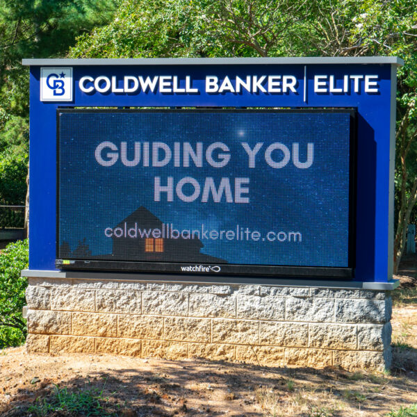 Coldwell Banker Elite monument sign with UL-Listed message center during install in Stafford, VA.